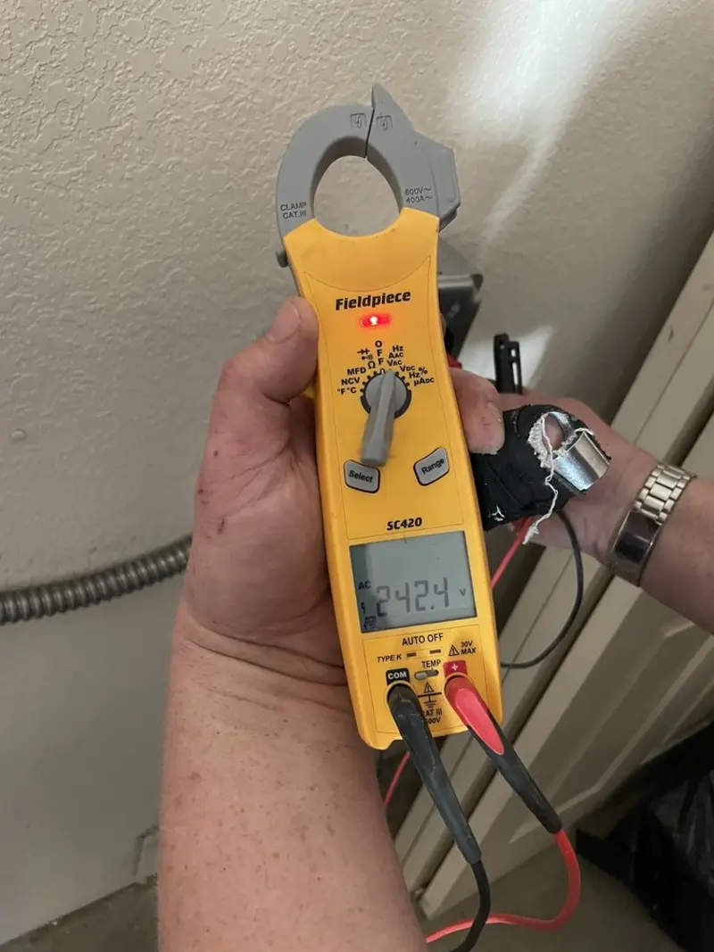 Voltage testing with clamp meter during Generator Installation in Waverly